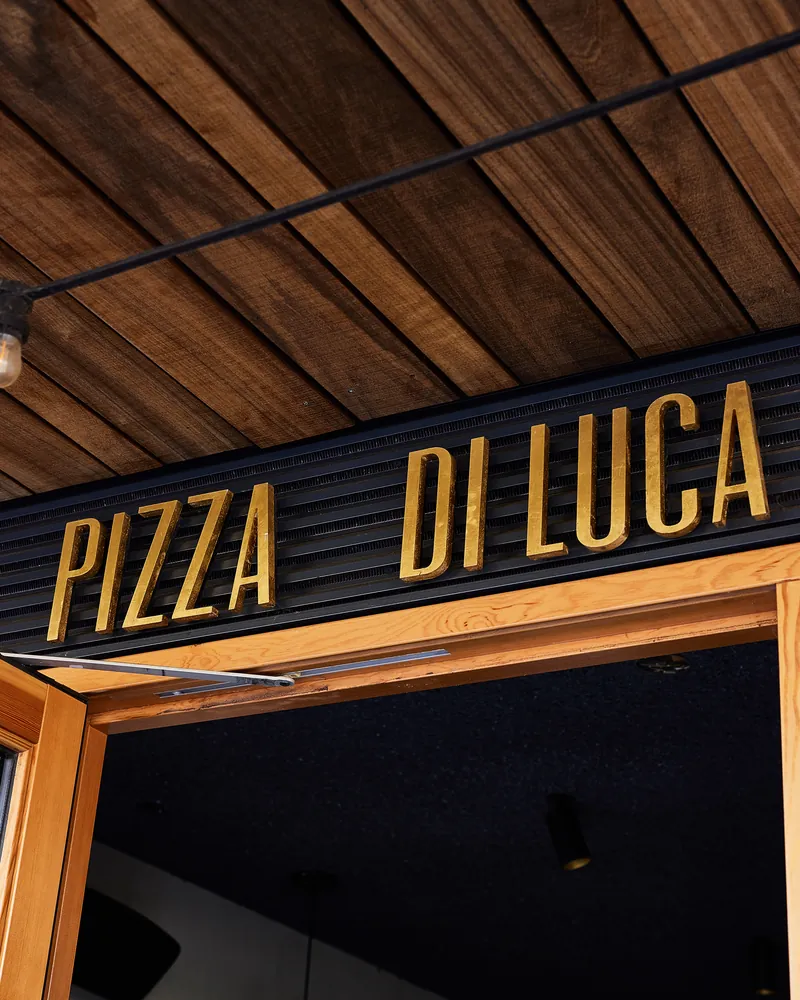 The Di Luca sign over the door