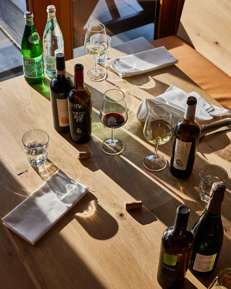 Wine and water on a laid table