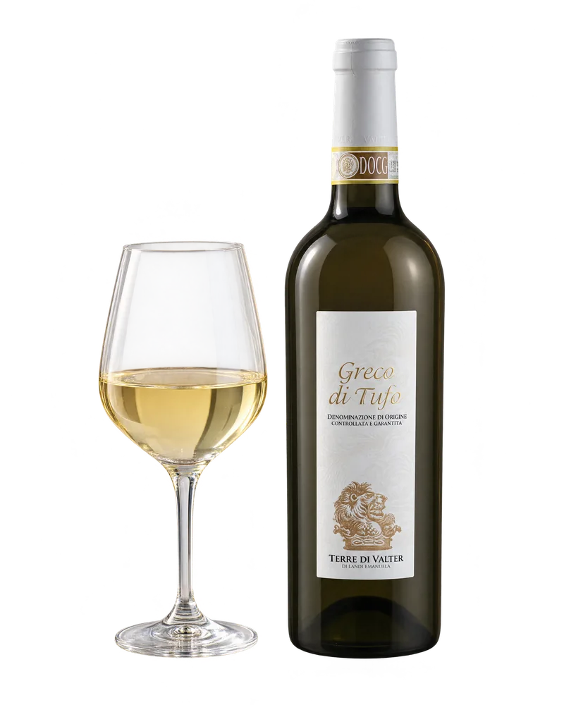 A bottle of Greco di Tufo beside a glass of white wine