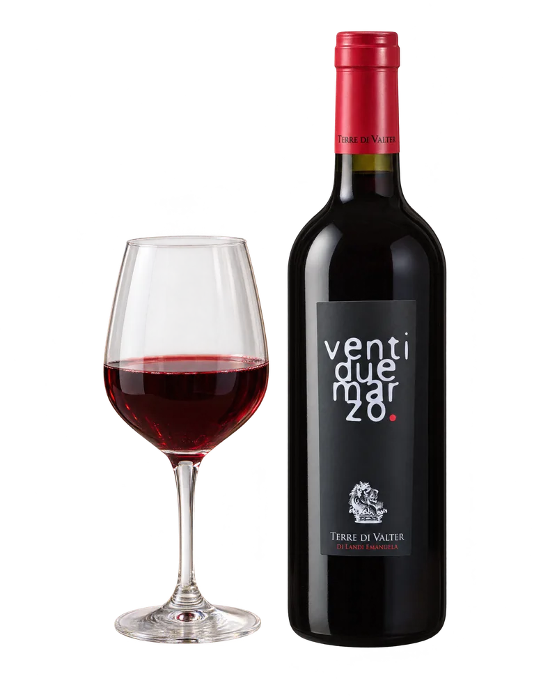 A bottle of Ventidue Marzo beside a glass of red wine