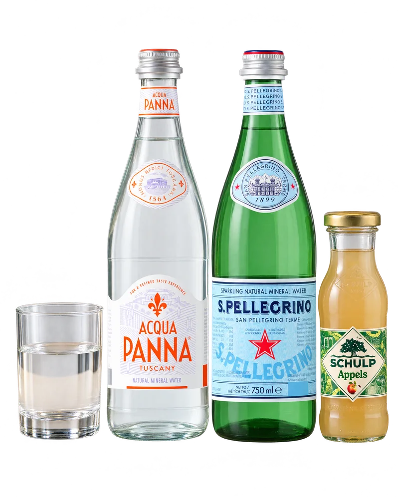 Bottles of Acqua Panna, San Pellegrino and Schulp apple juice