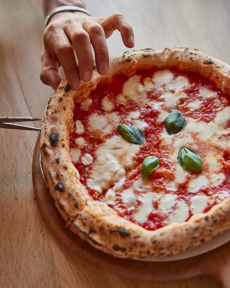 A Margherita cut into slices